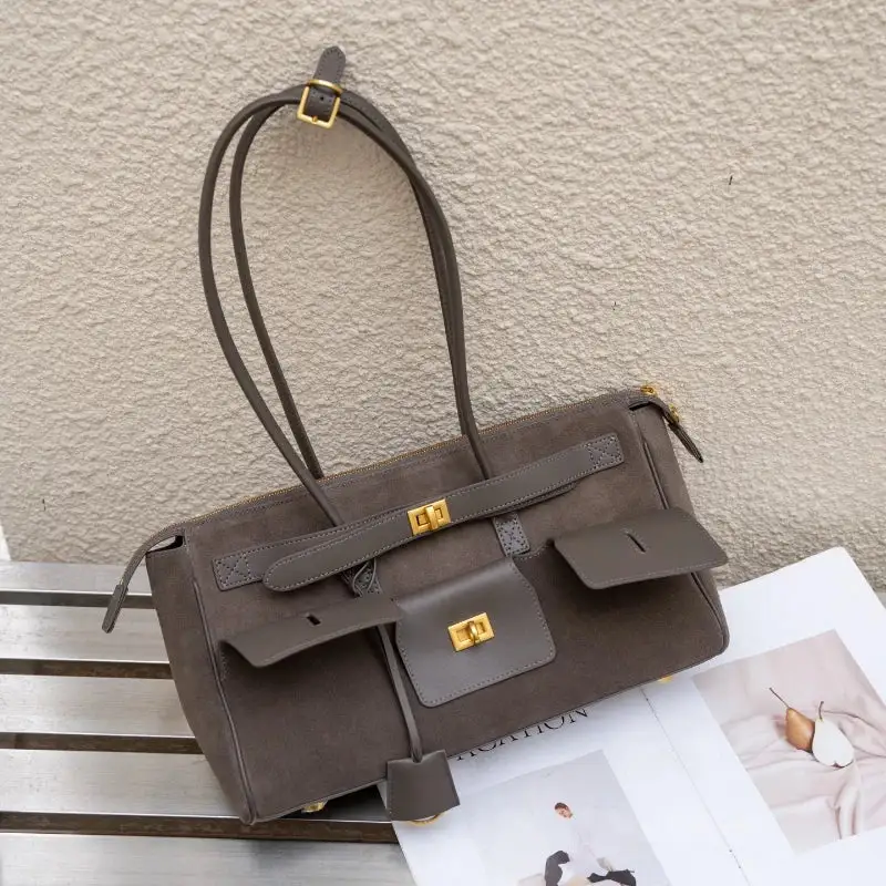 Statement Detail: Genuine Leather Buckle-Handle Handbag