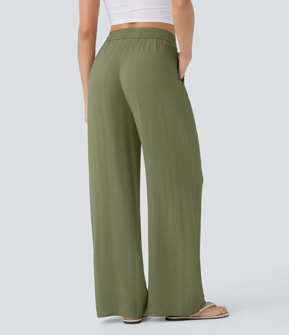 2026🔥  Wide-leg, flowing, high-waisted trousers with drawstring, side pockets and a linen look