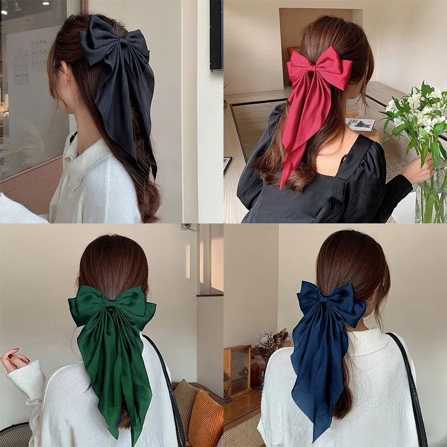 Oversized Satin Bow Hair Clip adds an elegant, feminine finish to everyday hairstyles in seconds. The flowing long-tail design looks beautiful with ponytails, half-up styles, curls and more.