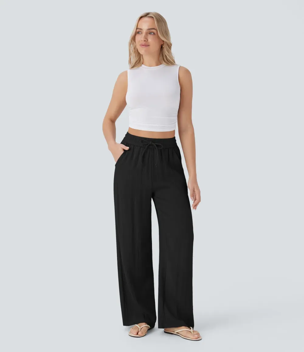 2026🔥  Wide-leg, flowing, high-waisted trousers with drawstring, side pockets and a linen look