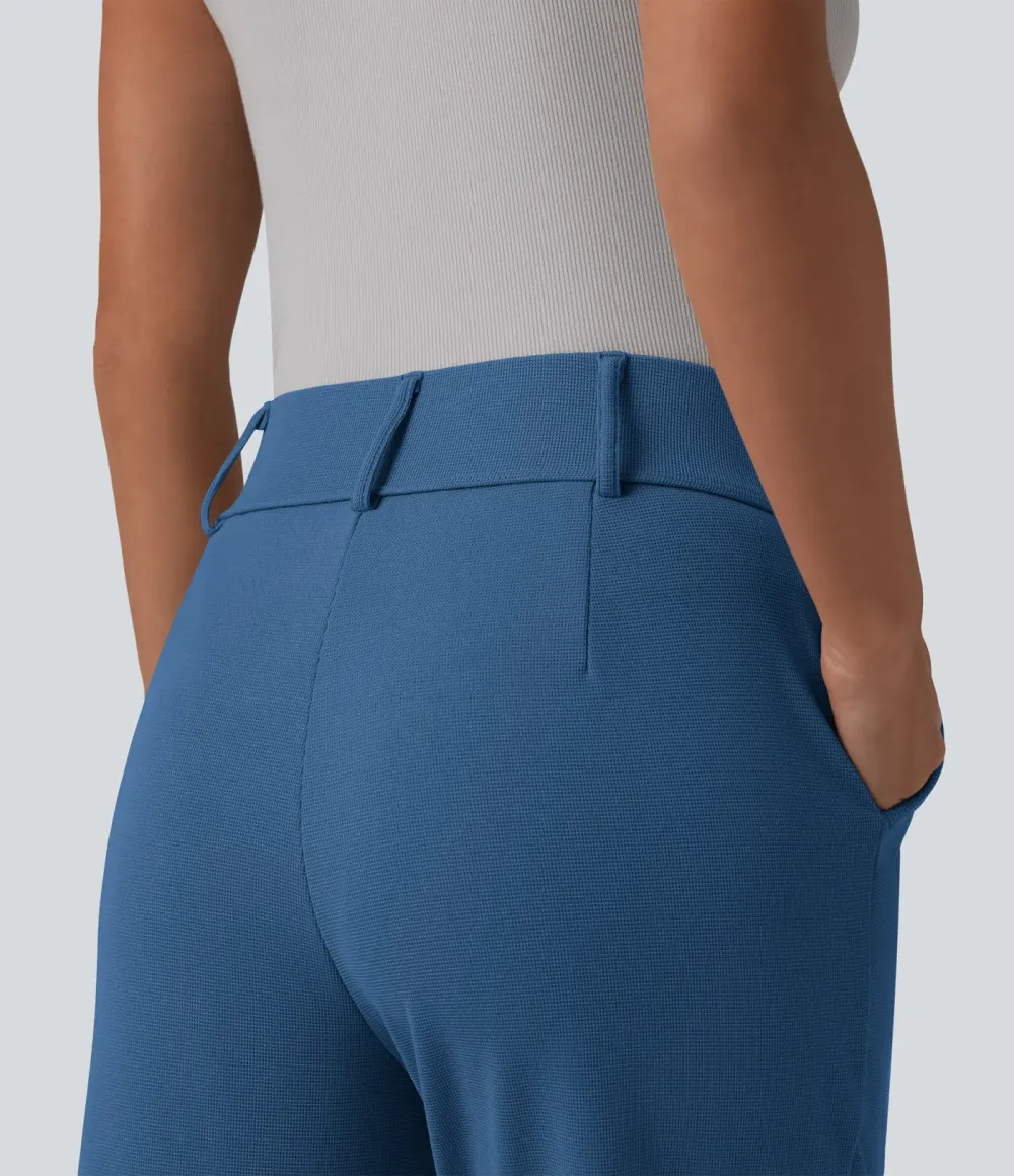  - Tapered office trousers with a high waist, side pockets and waffle fabric