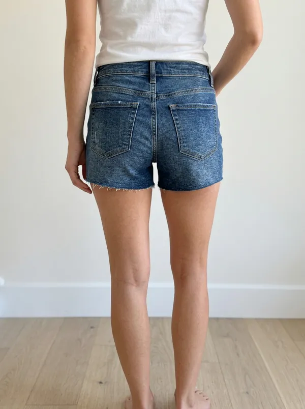 Women's Distressed Blue Denim Raw Hem Jean Shorts