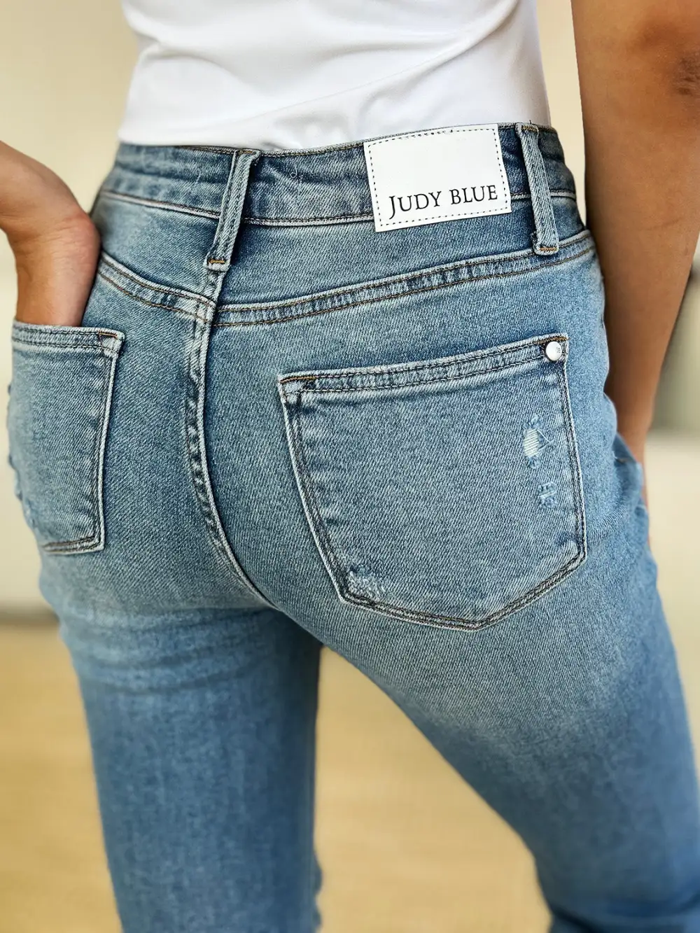 Washed Mid Rise Distressed Denim Jeans