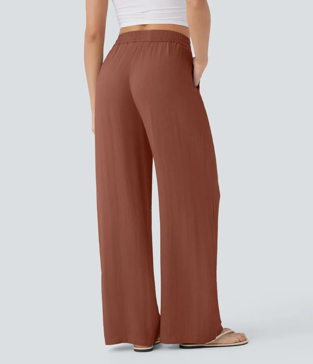 2026🔥  Wide-leg, flowing, high-waisted trousers with drawstring, side pockets and a linen look