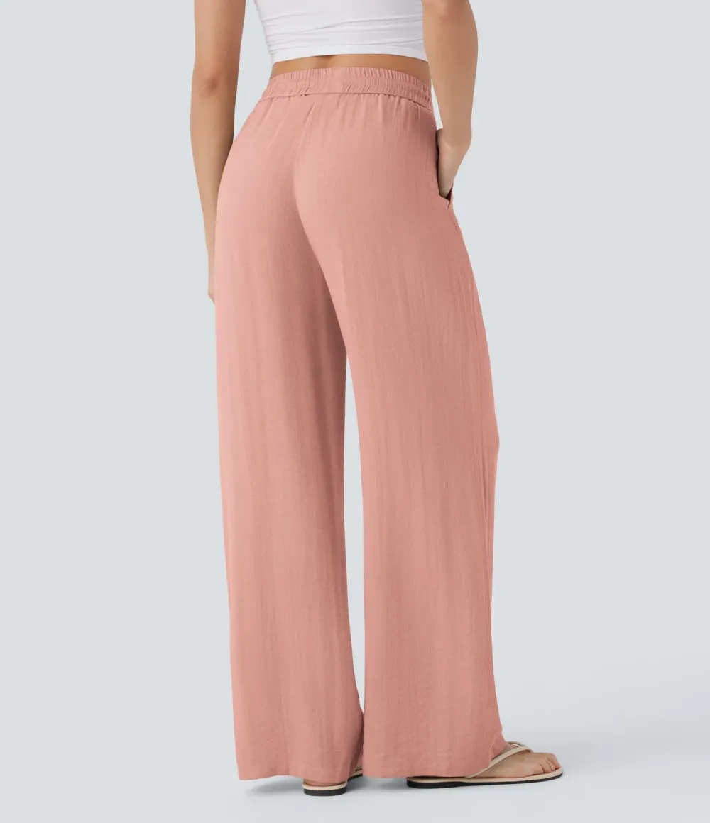 2026🔥  Wide-leg, flowing, high-waisted trousers with drawstring, side pockets and a linen look