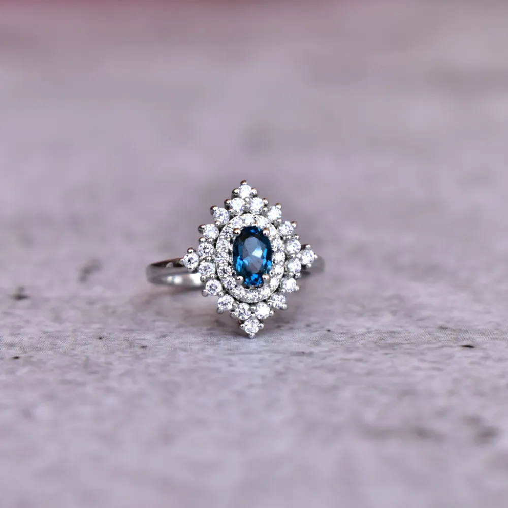 Polished Delicate Topaz Ring