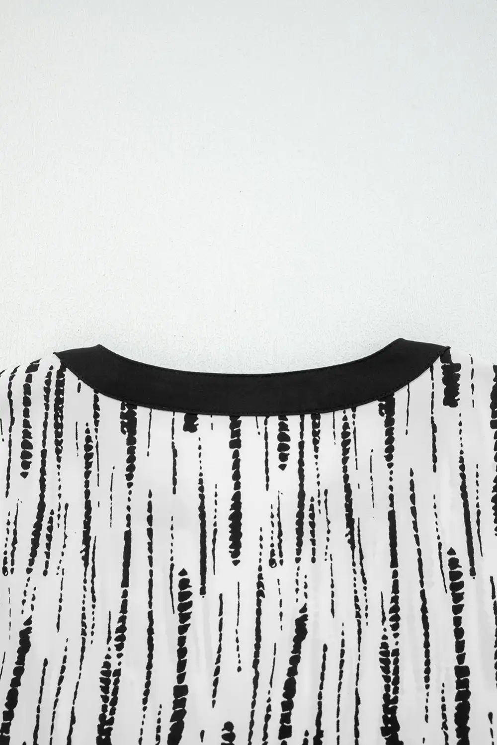 White Abstract Printed V Neck Fall Blouse