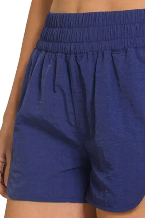 Pocketed Windbreaker Smocked Waistband Running Shorts