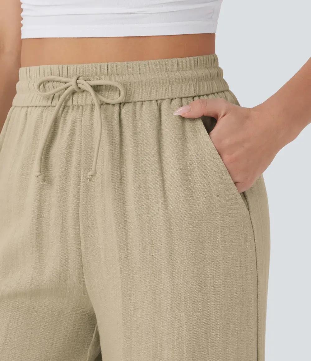 2026🔥  Wide-leg, flowing, high-waisted trousers with drawstring, side pockets and a linen look