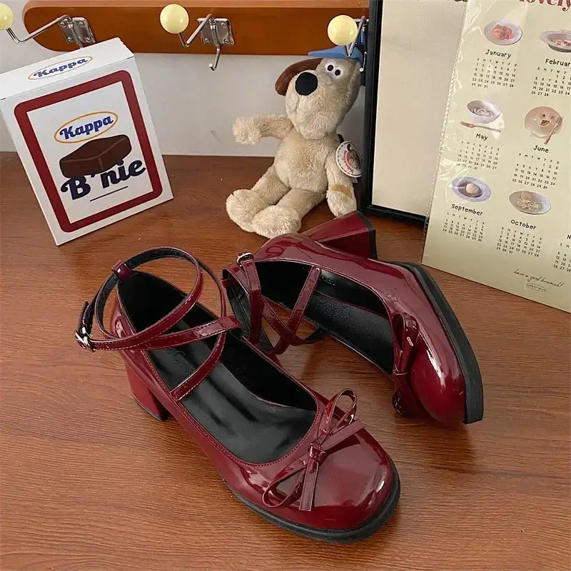 Bow-Detail Mary-Jane Round-Toe Pumps