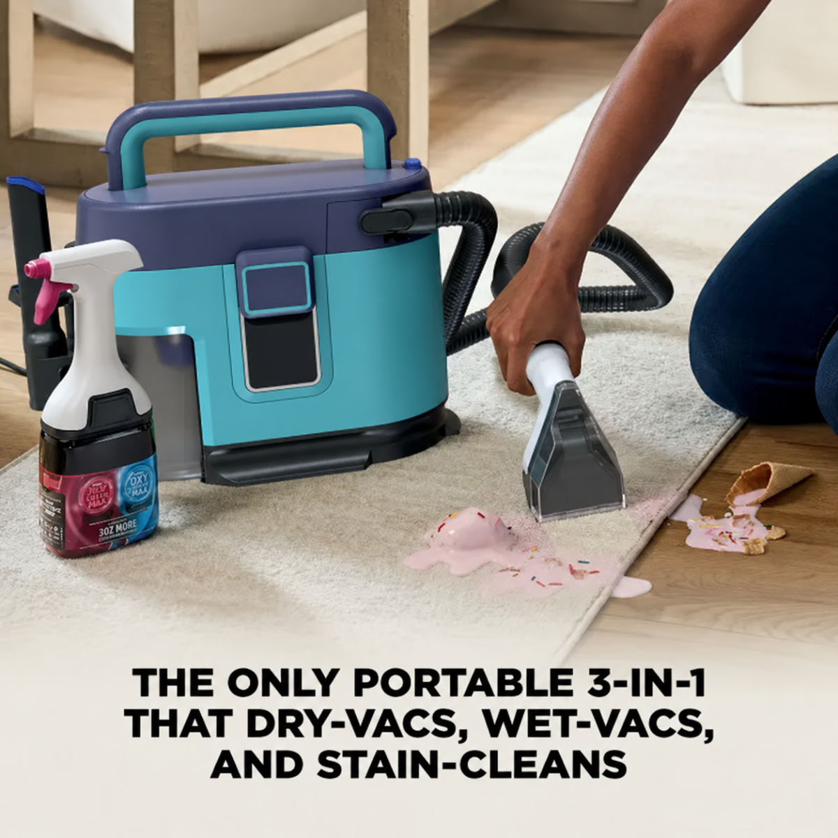 Using the portable cleaner to lift a carpet spot
