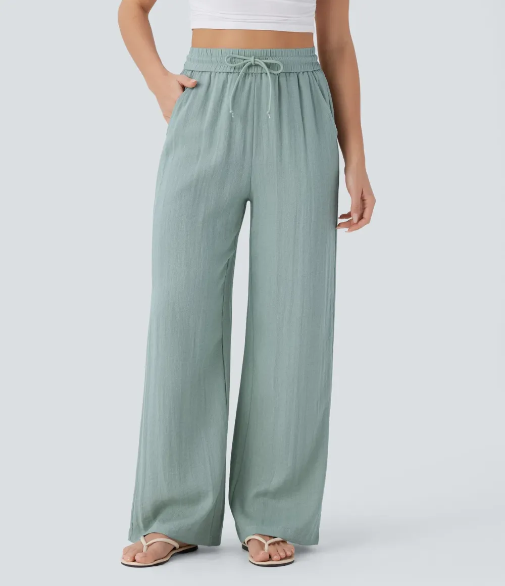 2026🔥  Wide-leg, flowing, high-waisted trousers with drawstring, side pockets and a linen look