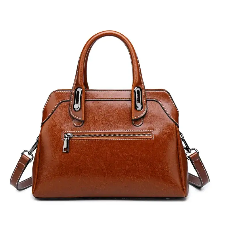 Structured Heritage: Genuine Leather Buckle-Handle Handbag