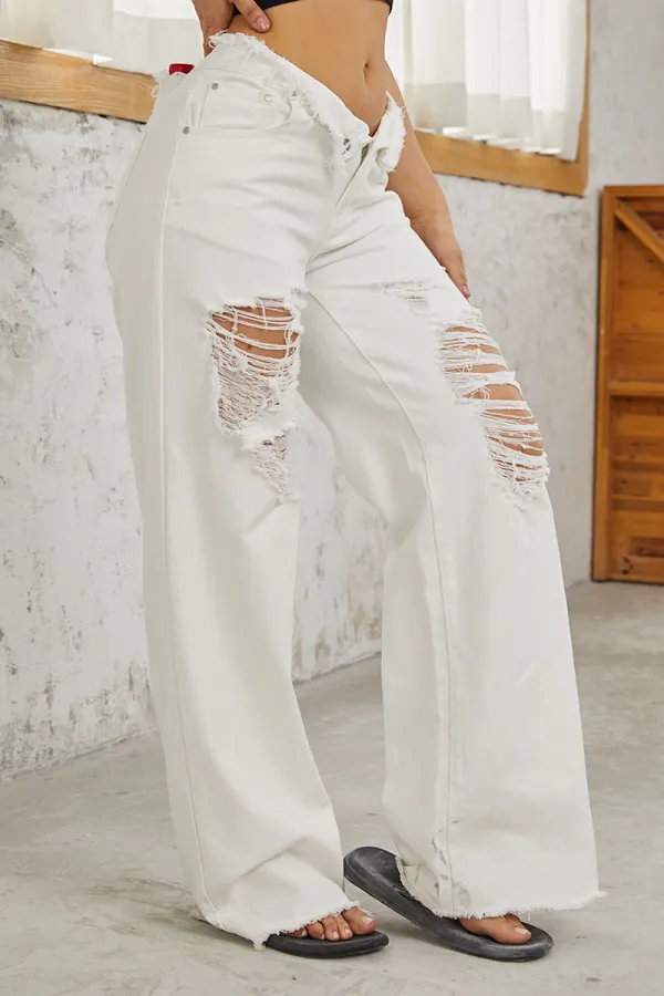 Mid Waist Ripped Raw Hem Flare Jeans
