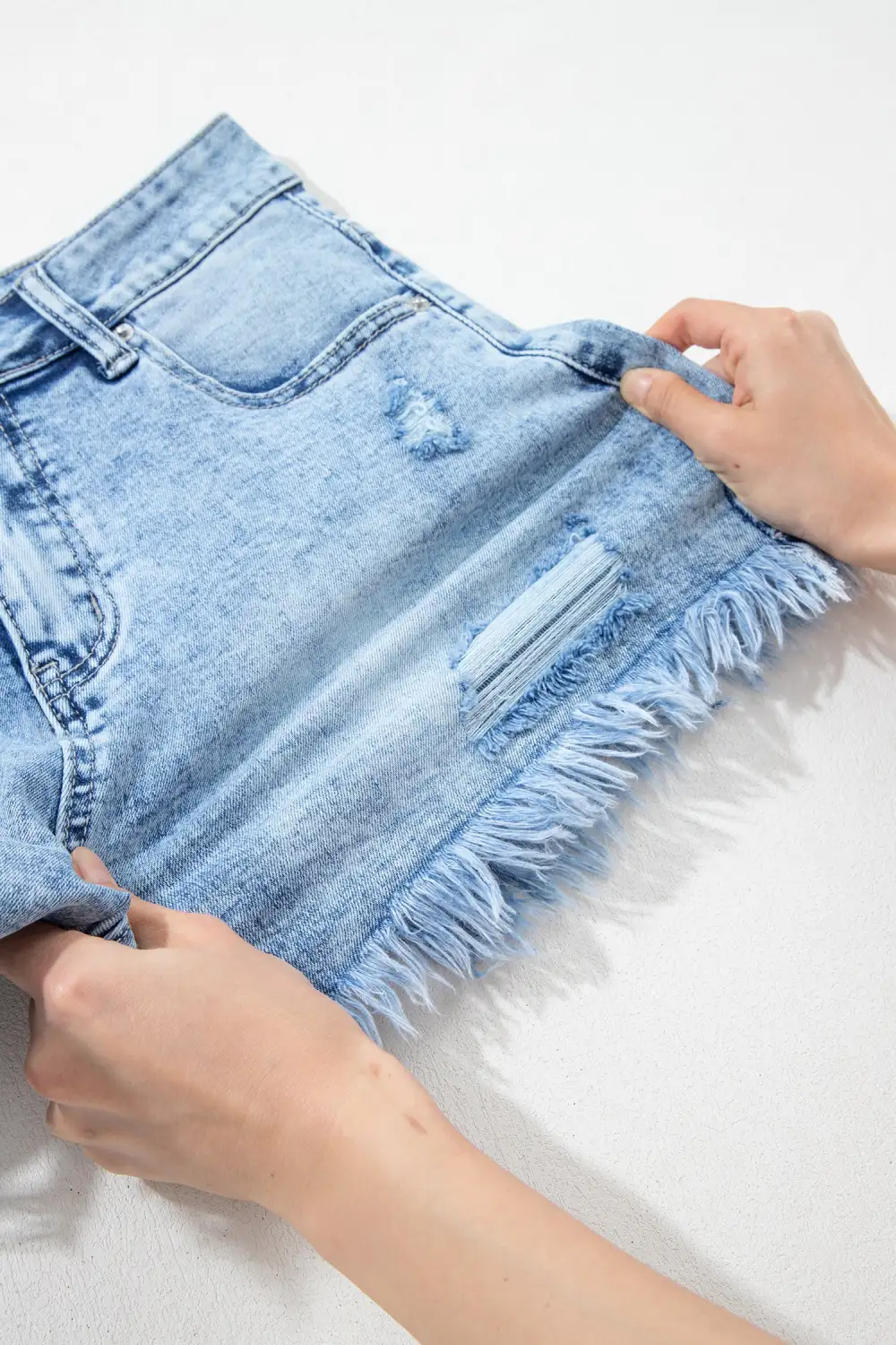 High-Waist Frayed Distressed Pocketed Denim Shorts