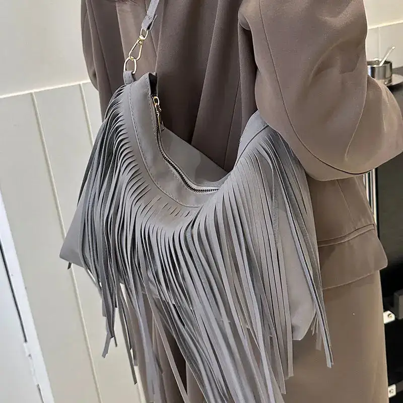 Elegant Detail: Tassel Red Leather Mini Crossbody Bag