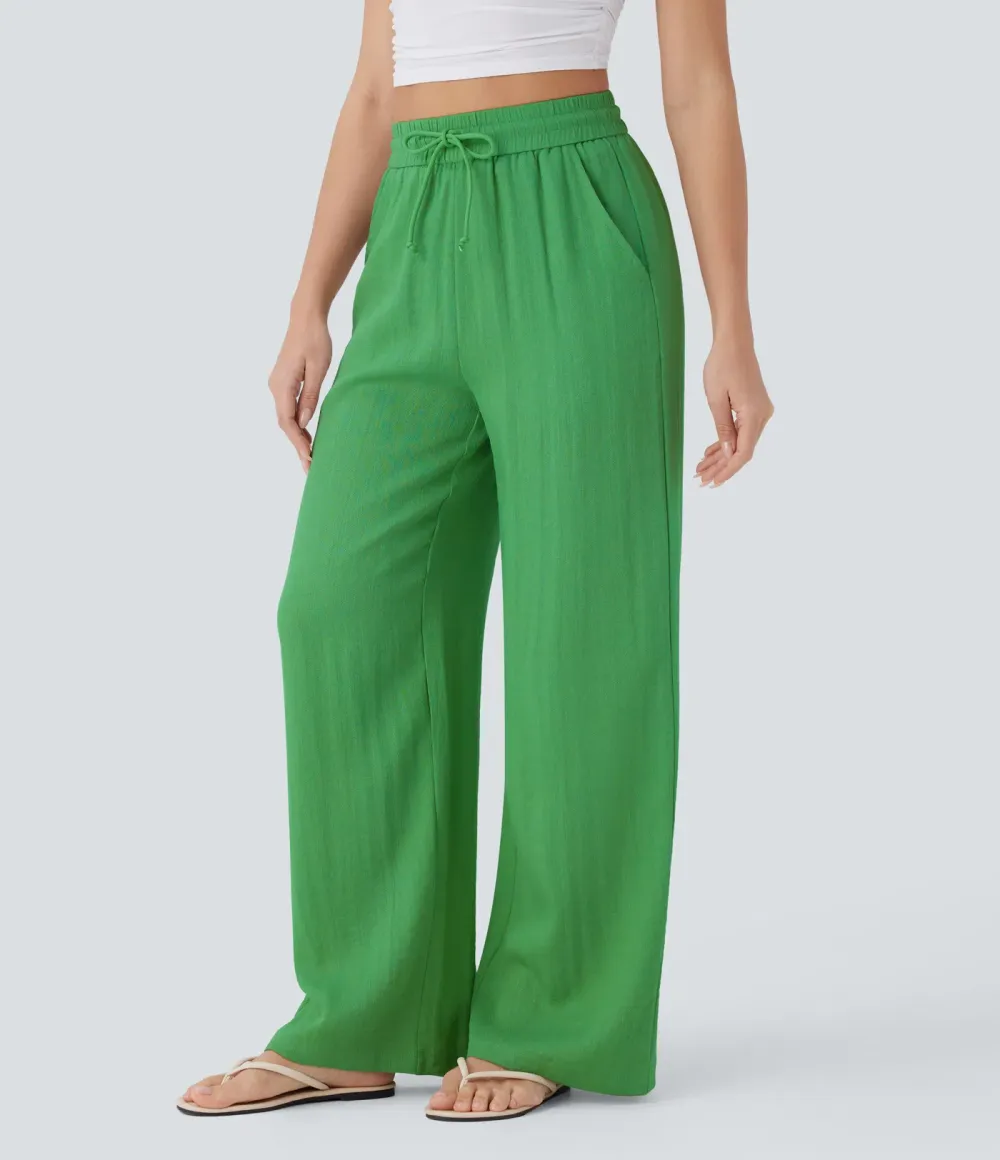 2026🔥  Wide-leg, flowing, high-waisted trousers with drawstring, side pockets and a linen look