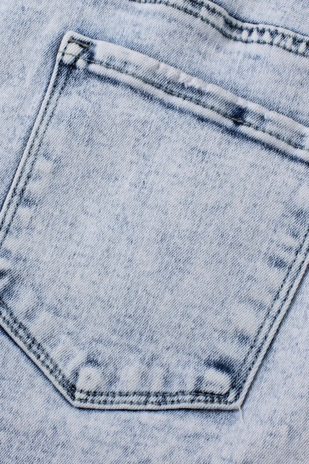Light Blue Acid Wash Crossed Raw