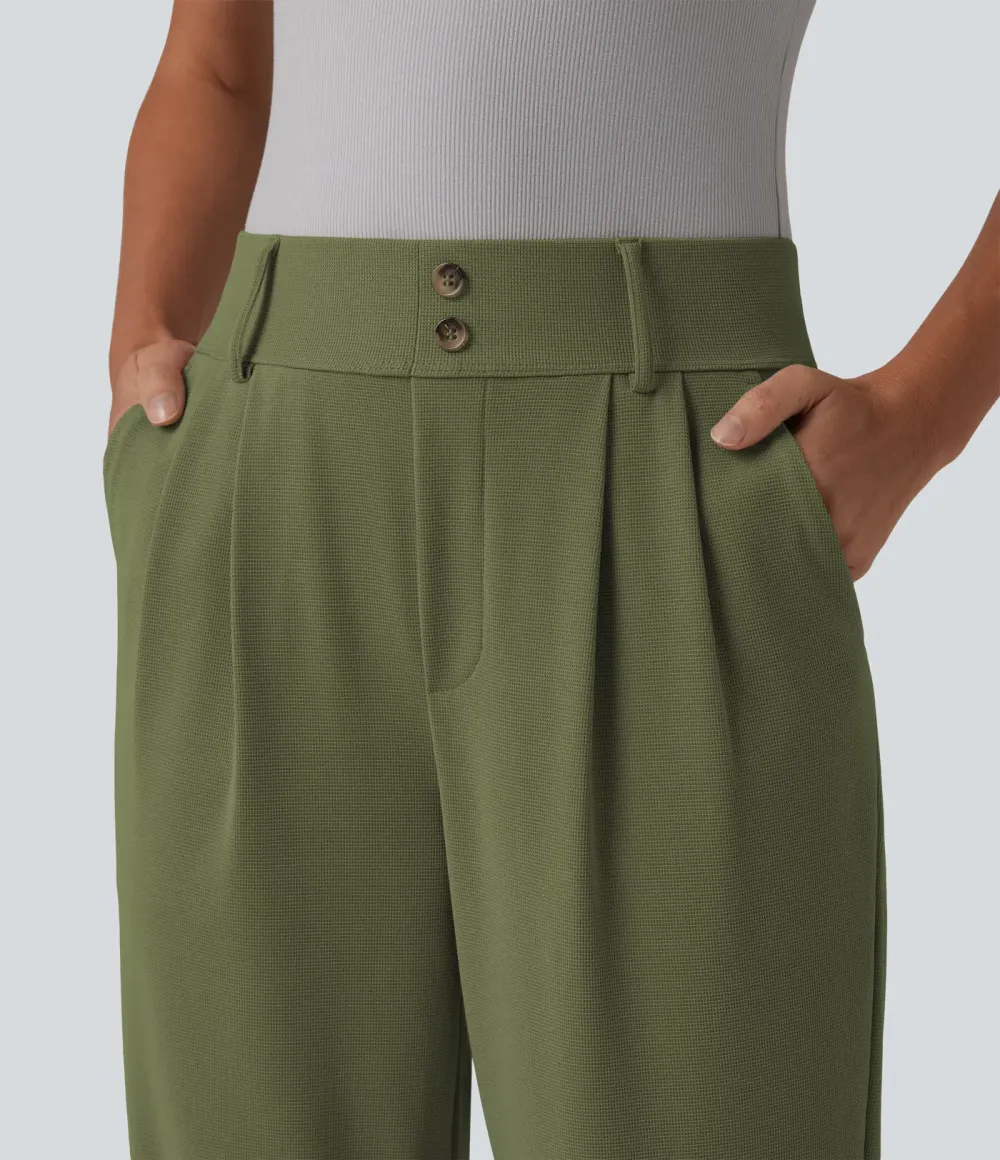  - Tapered office trousers with a high waist, side pockets and waffle fabric
