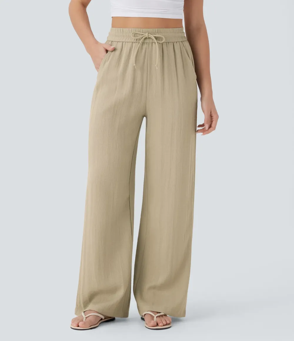 2026🔥  Wide-leg, flowing, high-waisted trousers with drawstring, side pockets and a linen look