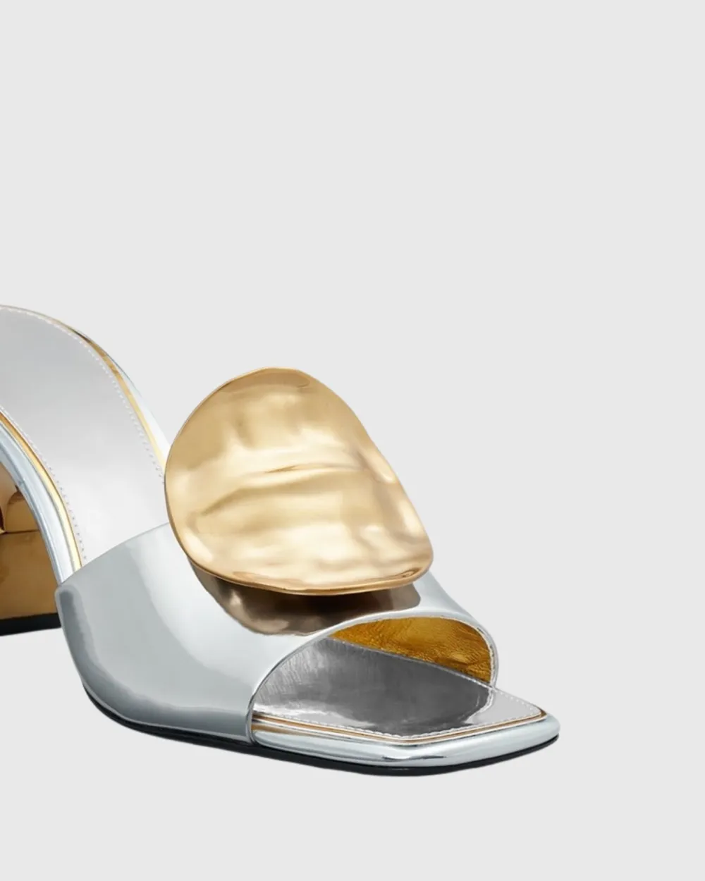 Metal Coin Asymmetrical Slippers in Silver
