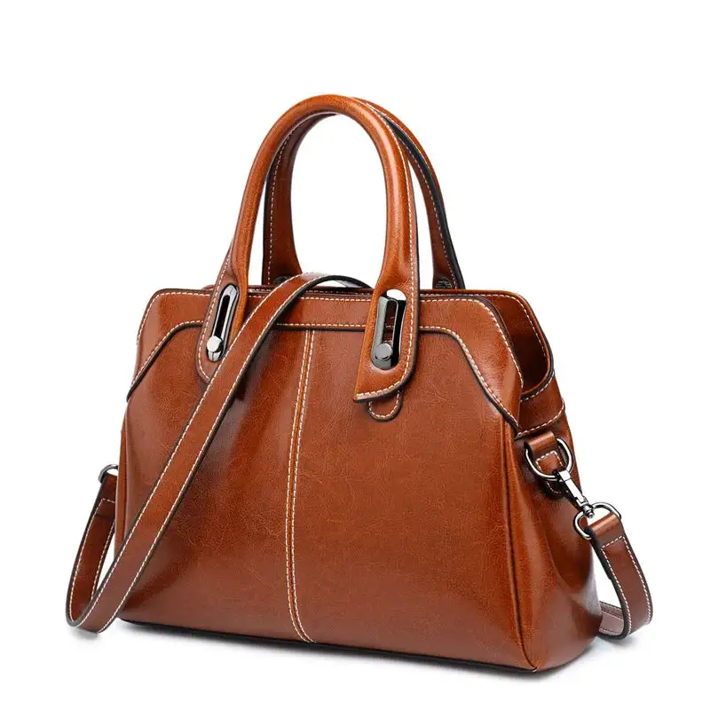 Structured Heritage: Genuine Leather Buckle-Handle Handbag