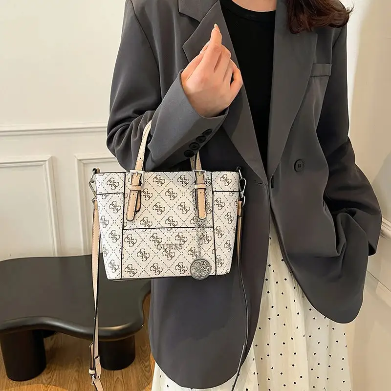 Statement Accessory: Chic High-Gloss Luxury Handbag