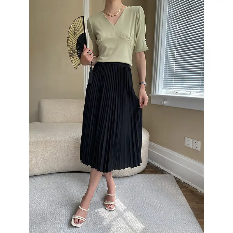 Streamlined V-Neck Pearl Button Sleeveless T-Shirt