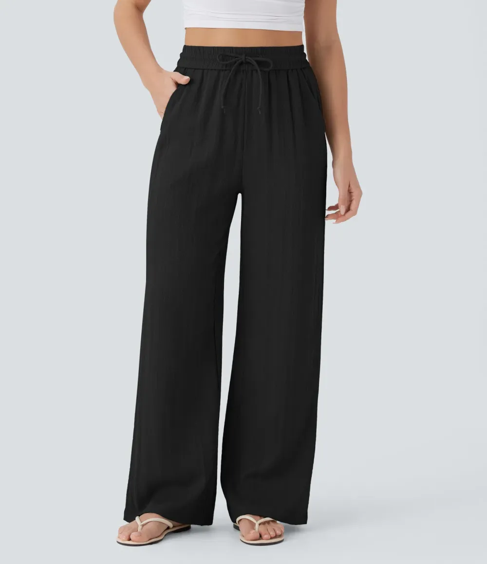 2026🔥  Wide-leg, flowing, high-waisted trousers with drawstring, side pockets and a linen look